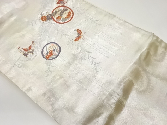 丸文に蝶・花々模様織出し名古屋帯